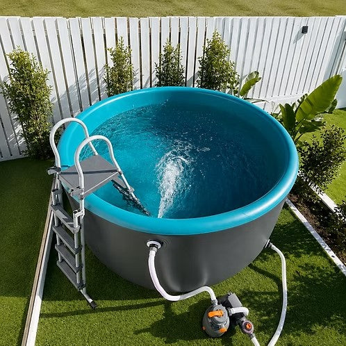 Drop stitch inflatable pool set up in backyard with ladder and filter